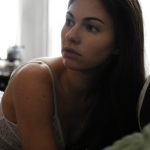 Woman looking at door